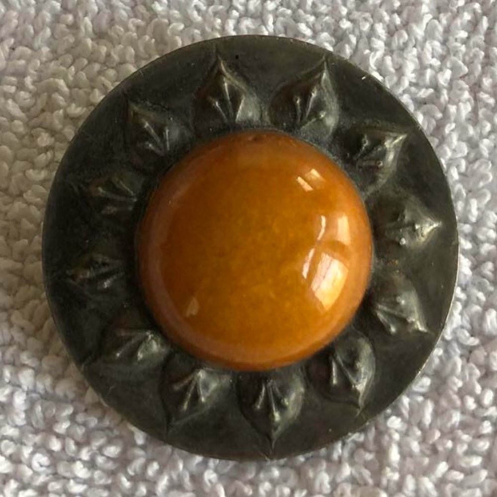 Pewter brooch